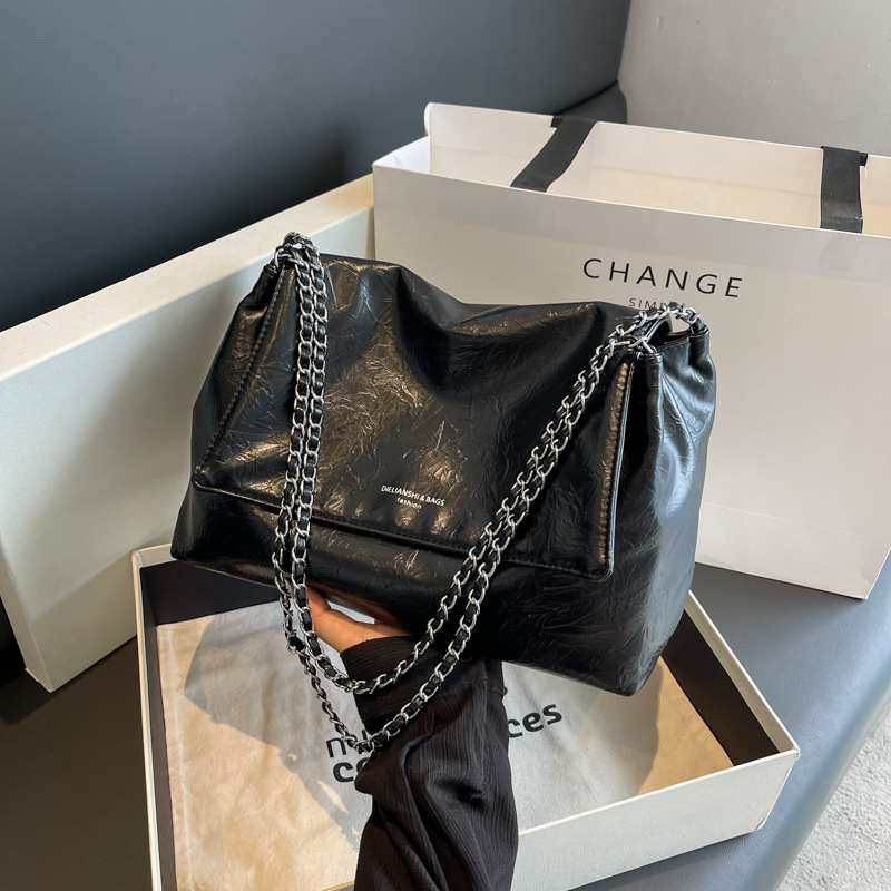Sac fourre-tout spacieux en cu - Luxury Bags Logo avis et prix