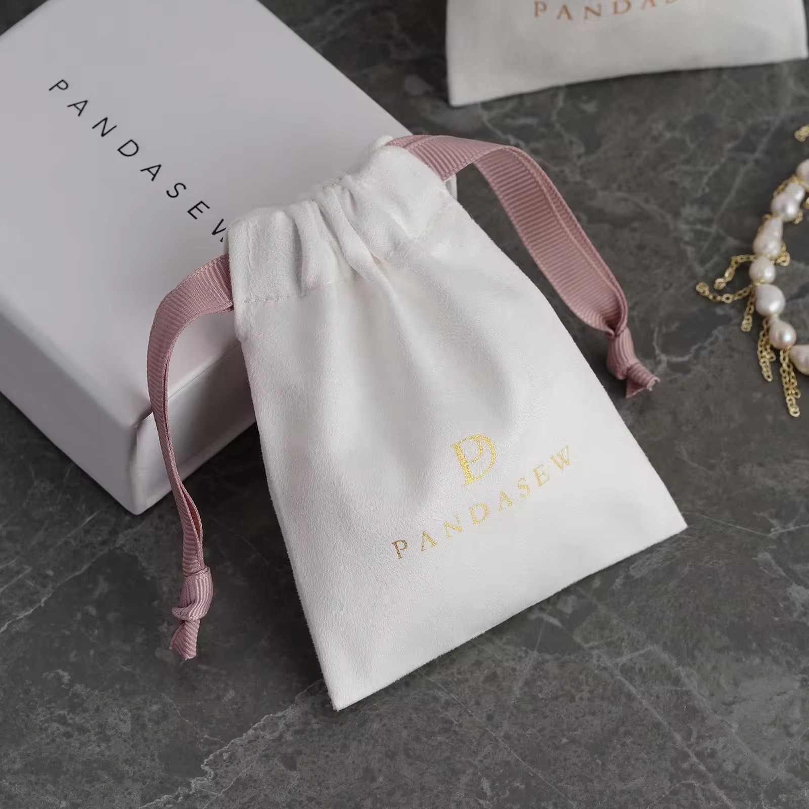 Sac à bijoux en daim de luxe a - Luxury Bags Logo avis et prix